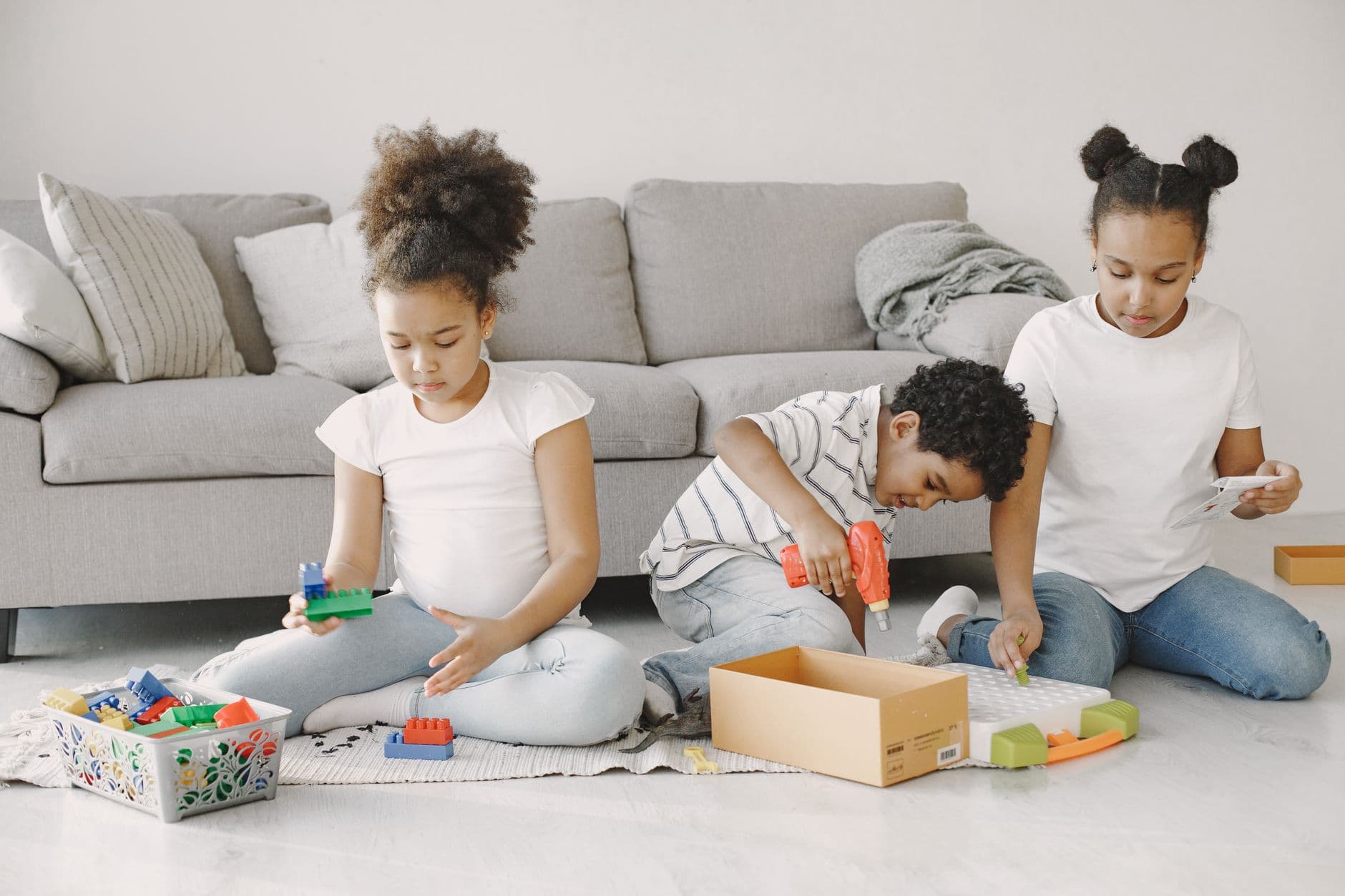 Children playing together with building blocks